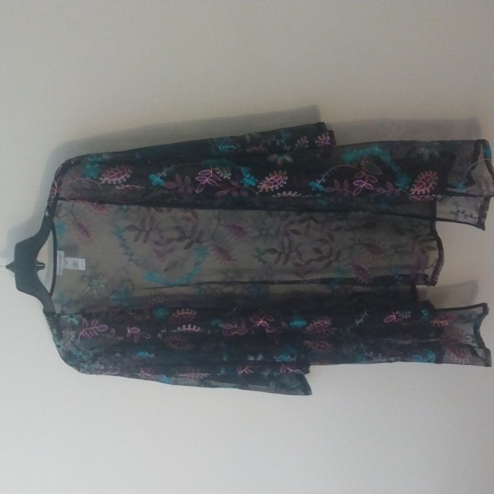 Catherine's black, nylon jacket.